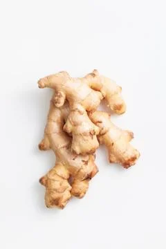 Young fresh ginger root on white background Stock Photos