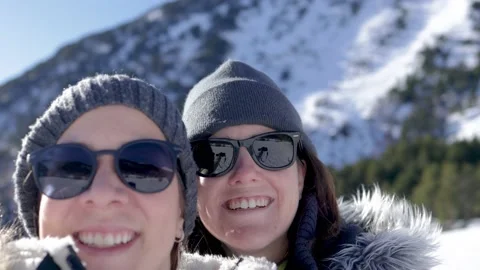 Young friends having fun doing video during winter vacation with mountain snow Stock Footage 170248122