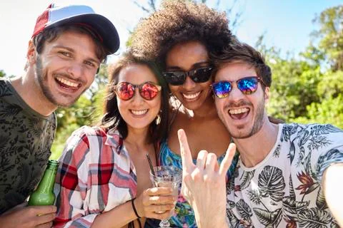 Young friends having fun at poolside Stock Photos