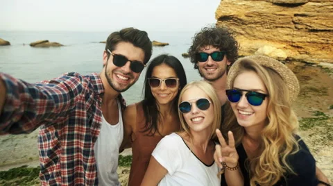 Young friends taking selfie on the beach Stock Footage 68795383