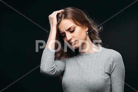Young frustrated women looking down Stock Photos