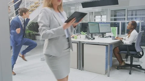 Young Fun Loving and Handsome Businessman Fooling Around, Dances Through Office Stock Footage 106766090