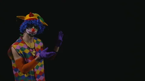 Young funny mime pointing at something showing presenting and explaining Stock Footage 60427595