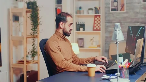 Young game developer testing the interface Stock Footage 125176572