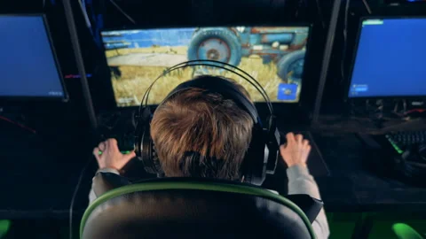 Young gamer playing on a modern pc. Professional Gamer Plays computer games. Stock Footage 100593154