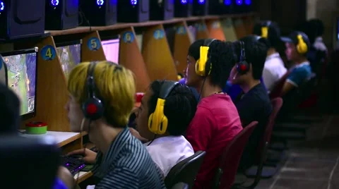 Young gamers play video games at one of city computer game clubs Video stock 59594319