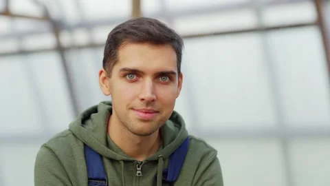 Young gardener smiling at camera Stock Footage 142410674