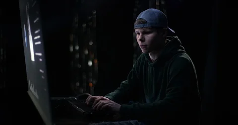 Young geek hacking rapidly Stock Footage 101397067