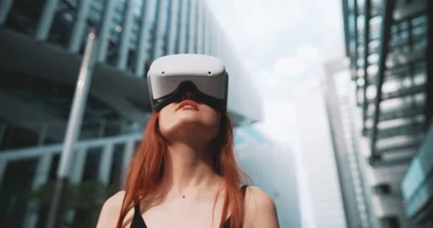 Young ginger woman using vr in the business district Stock Footage 201678734