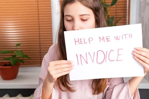 Young girl asking for help doing domestic accounting paperwork bills and Stock Photos
