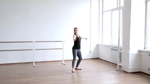 A young girl is an aspiring dancer.  Dance studies. Stock Footage 122561753
