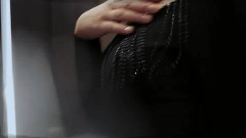 Young Girl In Black Dress In Hall. She Poses. 動画素材 190857553