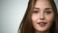 Young Girl With Braces On Teeth Throws Back Her Head And Appears In The Frame. Stock Footage