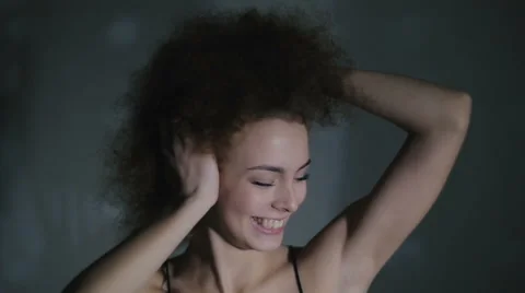 The young girl broadly smiles and has fun Stock Footage 59238588