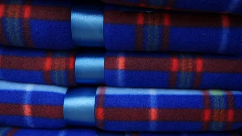 Young girl choosing bath towels textile in apparel clothes shop supermarket, 4k Stock Footage