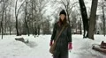 young girl in city park walking. Stabilized shot HD Footage