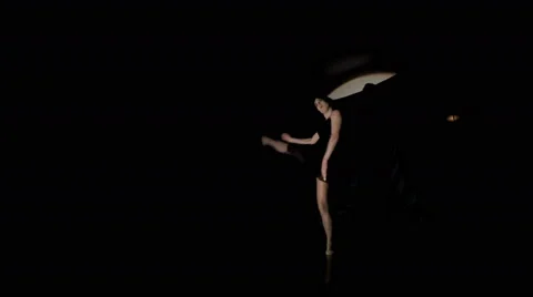 Young girl dancing on black background. Stock Footage 62183855