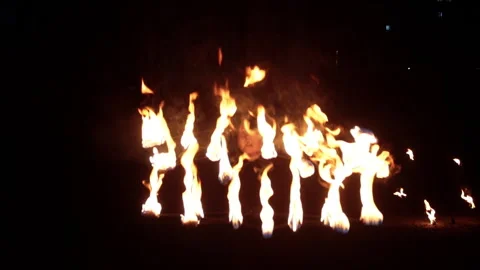 A young girl dancing with fire. Fire show, artist. Stock Footage 246214438