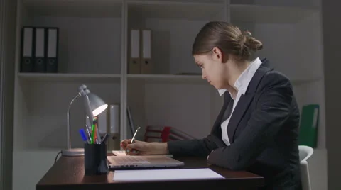 The young girl does notes in a notebook Stock Footage 58590993