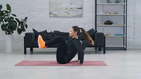 Young girl is doing exercises Stock Footage 117545179