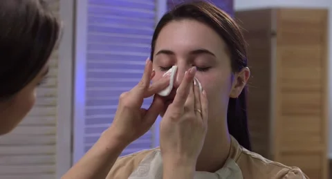 Young girl doing makeup Stock Footage 149103894