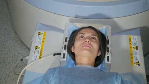 Young girl doing an MRI. Magnetic resonance imaging. Stock Footage 72546341