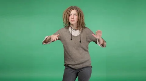 Young girl with dreadlocks dancing Stock Footage 68774936