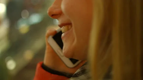 Young girl in the elevator talking on cell phone. Stock Footage 59414030