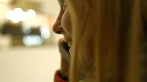 Young girl in the elevator talking on cell phone.  Stock Footage 59414551