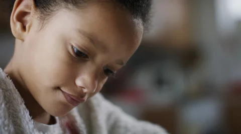 Young girl enjoying her colouring in book Stock Footage 59556363