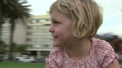 Young girl enjoying the roundabout Stock Footage