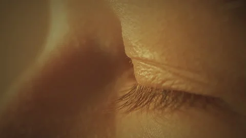 Young girl eye closeup loop. Blinking. Profile. Slow motion. Macro. Stock Footage 199087356