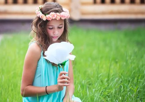 Young girl with flower Stock Photos
