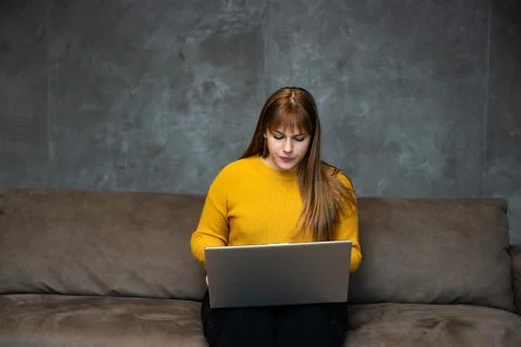 Young girl freelancer expert in programming web design marketing and advert.. Stock Photos