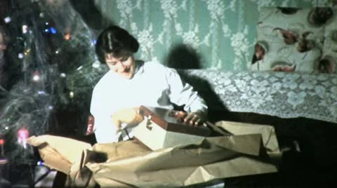 Young Girl Gets COSMETIC CASE CHRISTMAS Present 50s Vintage Film Home Movie 4583 Stock Footage