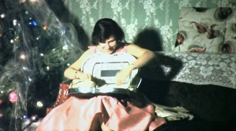 Young Girl Gets COSMETIC CASE CHRISTMAS Present 50s Vintage Film Home Movie 4584 Stock Footage