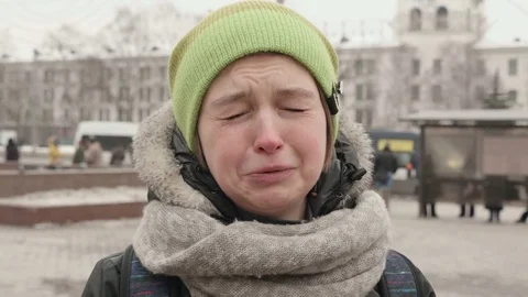 Young girl gets upset on the street and almost cries Video stock 73893953