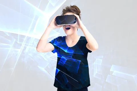 Young girl getting experience using VR headset glasses, is  augmented reality 스톡 사진
