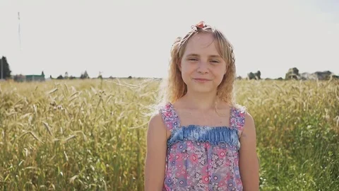 A young girl is given banknotes of dollars and she is very happy about it Stock Footage