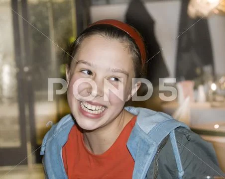 Young girl has fun and laughes Stock Photos