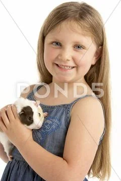 Young Girl Holding Pet Guinea Pig Stock Photos