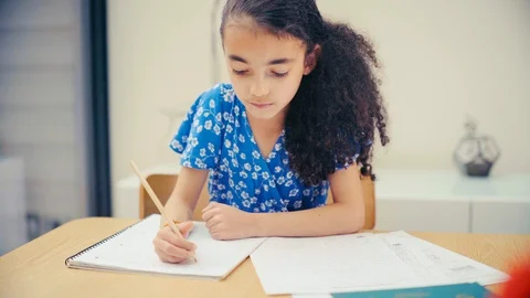 Young girl home schooling. Self isolation during Covid-19 crisis 库存影片 127692553