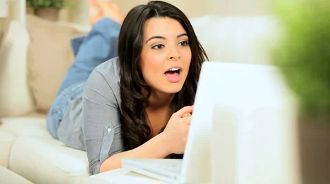 Young Girl at Home Using  Internet Webchat Stock Footage