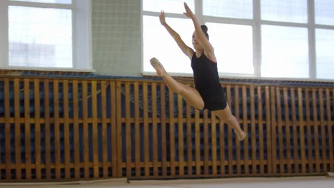 Young Girl Jumping with Front Splits Stock Video Pond5