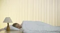 The young girl lay on the bed 4k or 4k+ Resolution
