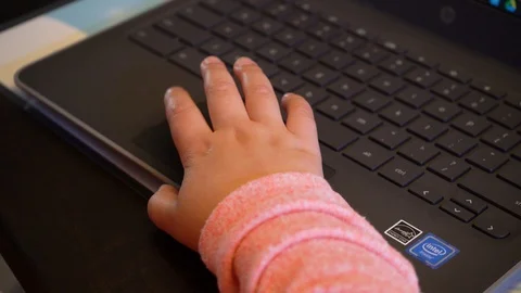 Young girl learning on laptop Stock Footage 127590984