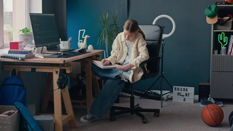 Young Girl Learning Programming on Computer at Home Desk Stock Footage 319735540