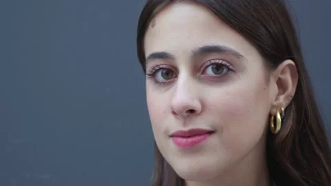 Young Girl Looking At The Camera Stock Footage 183040459