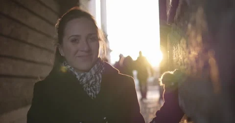 Young girl looking into camera at sunset 4K Stock Footage 46915679