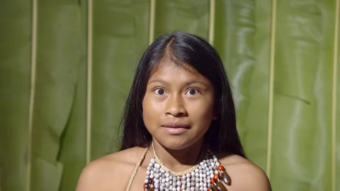 Young girl looking scared at the camera like the danger is coming from the Stock Footage 113182205